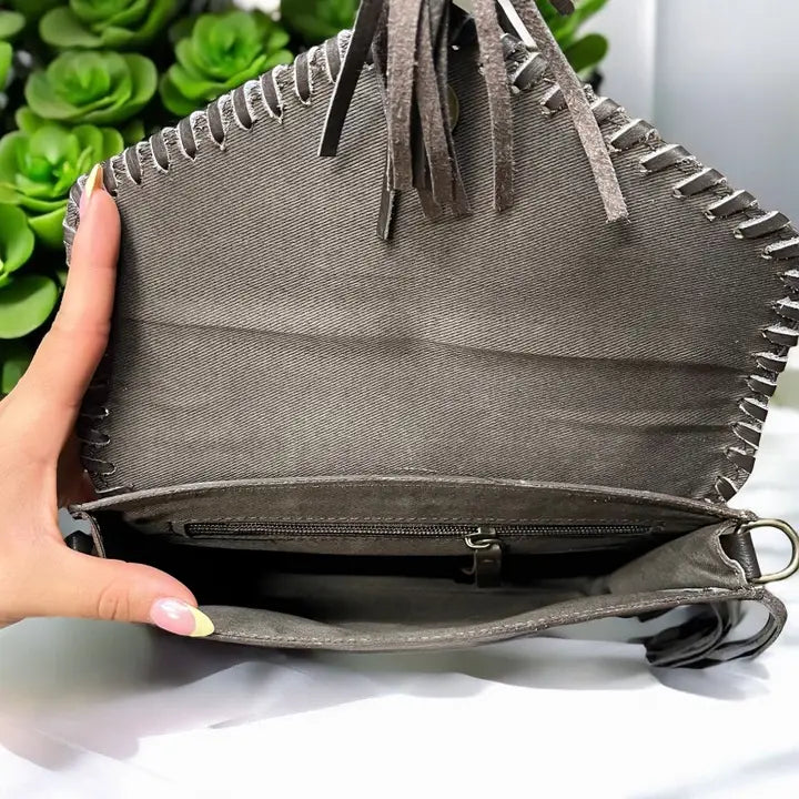 Brown hand tooled crossbody bag