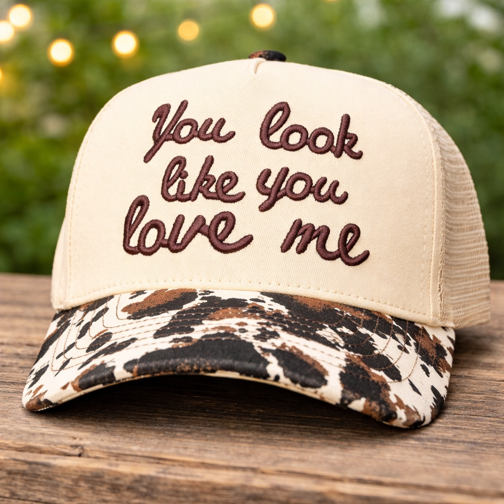 “You Look Like You Love Me” Cow Print Trucker Hat