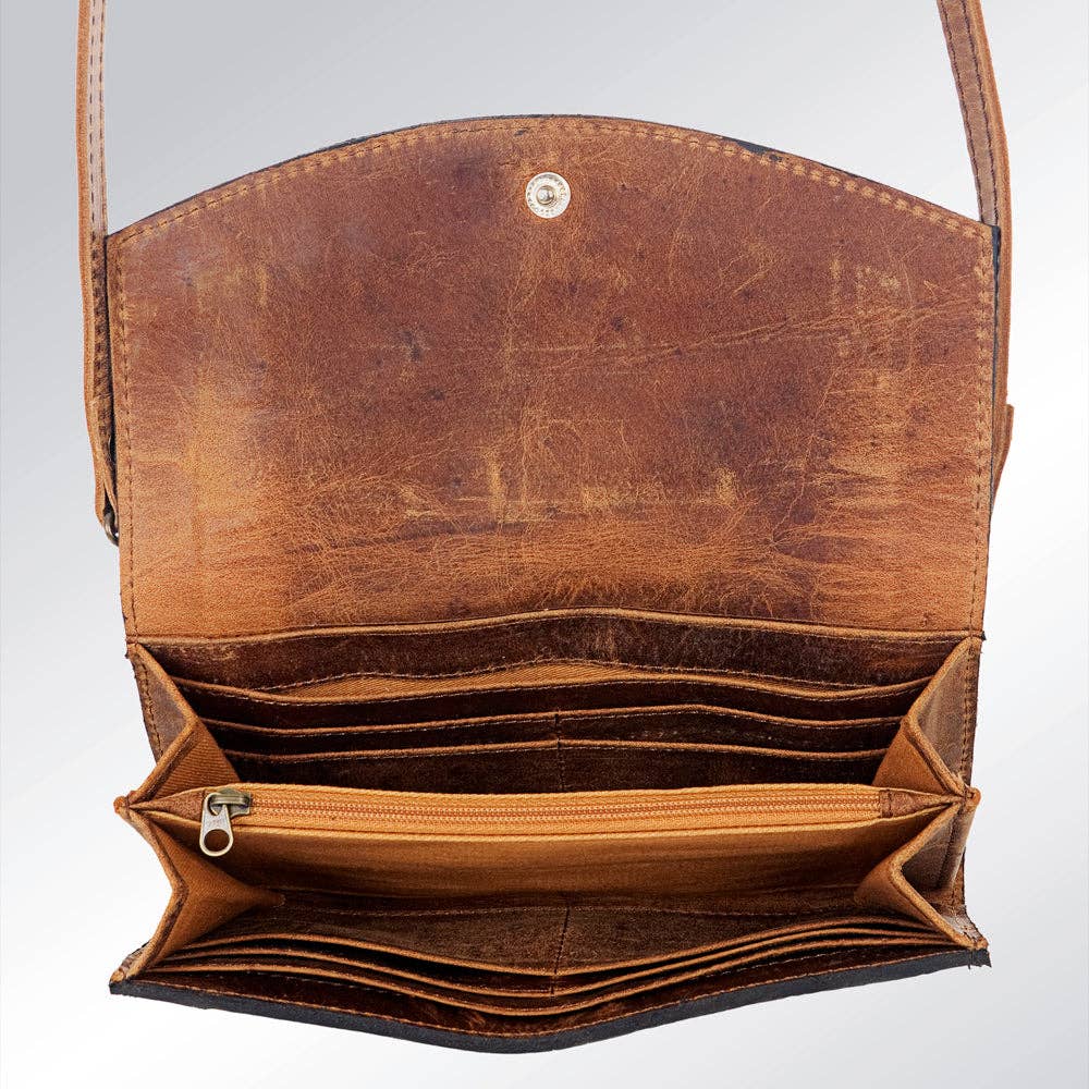 Cowhide Wallet with crossbody strap and wristlet.