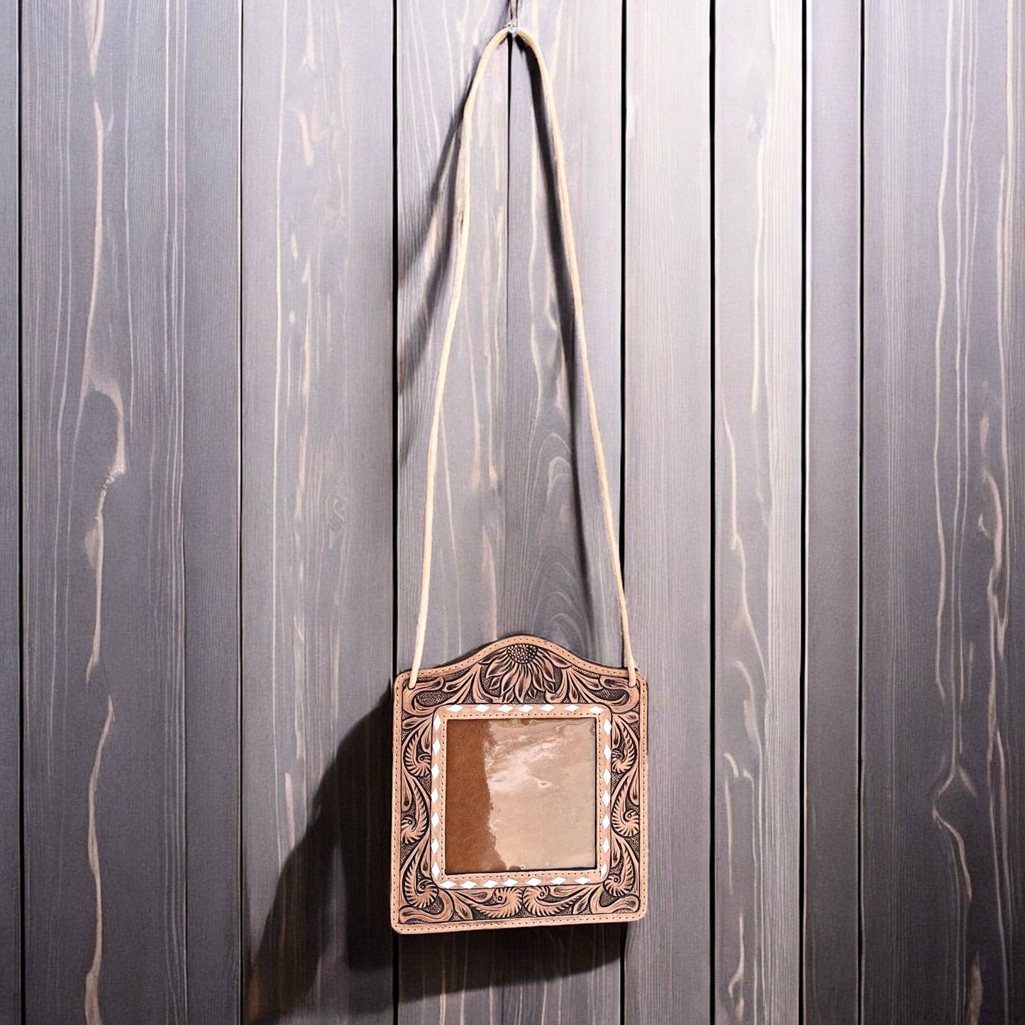 Tooled leather ID badge 