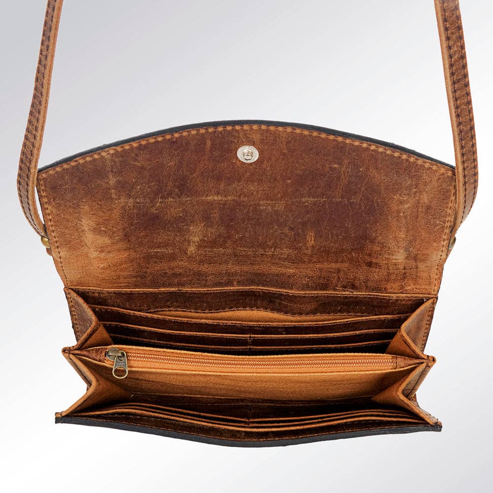 Cowhide Wallet with crossbody strap and wristlet.