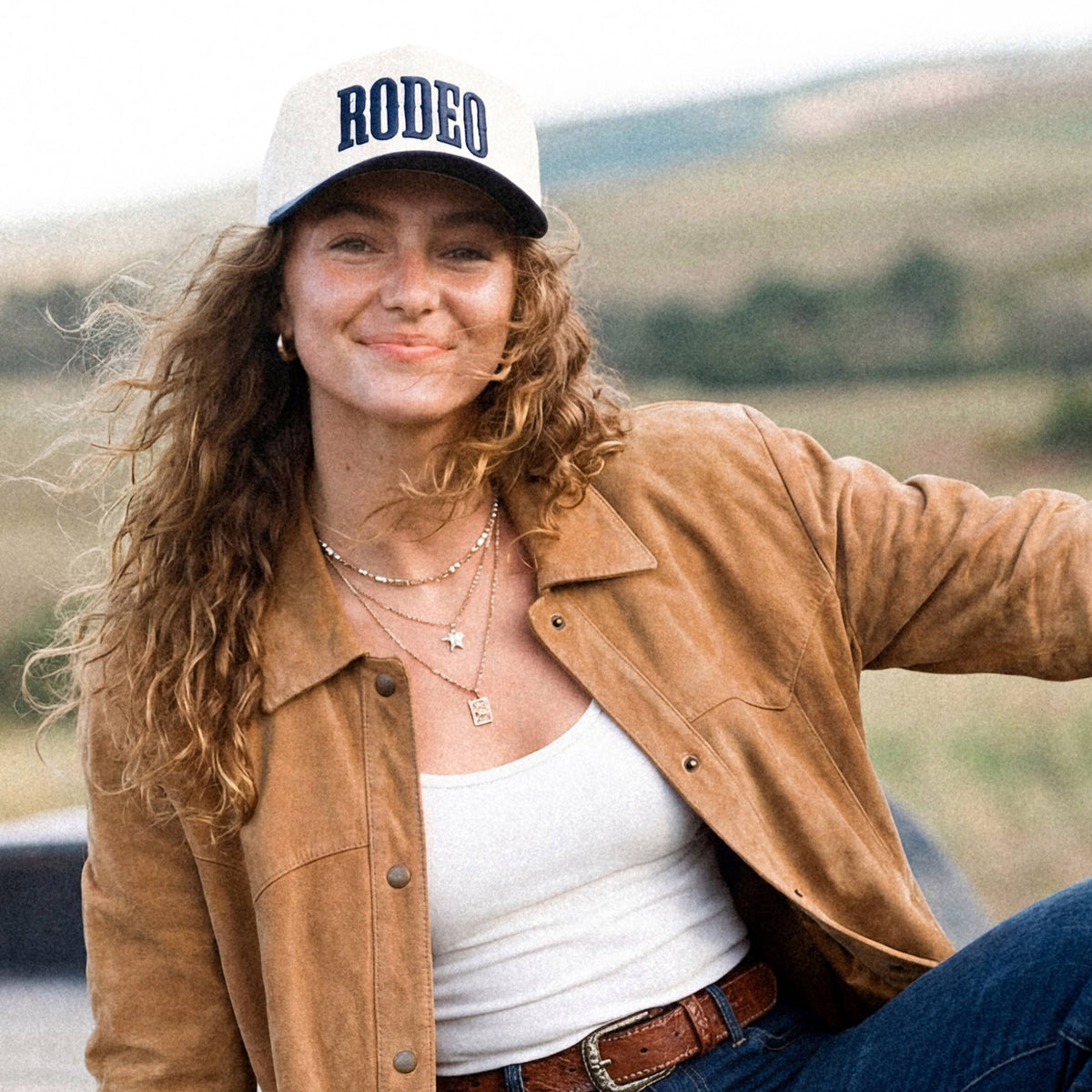 C.C RODEO Letter Embroidered Snapback Trucker Hat: Navy